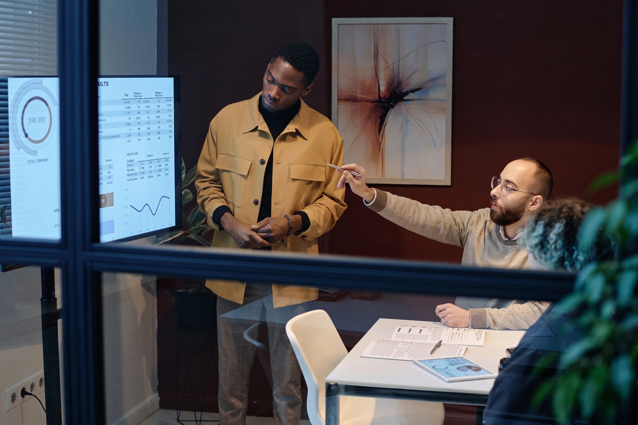 Colleagues reviewing marketing data in a conference room
