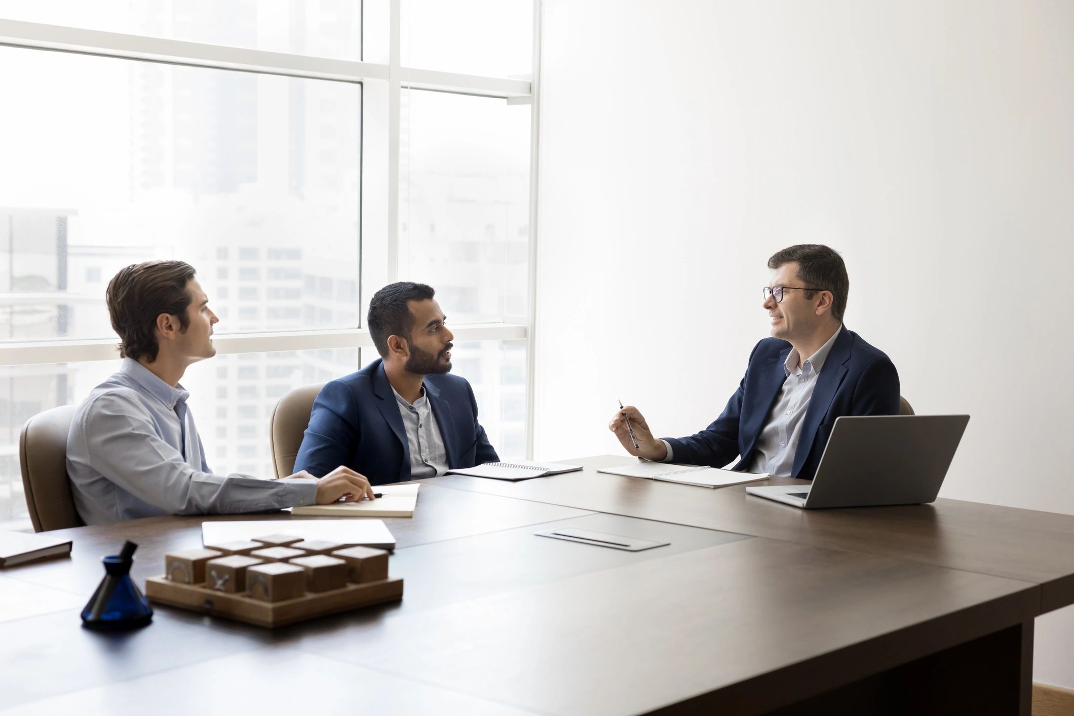 Business advisory leaders in a formal meeting