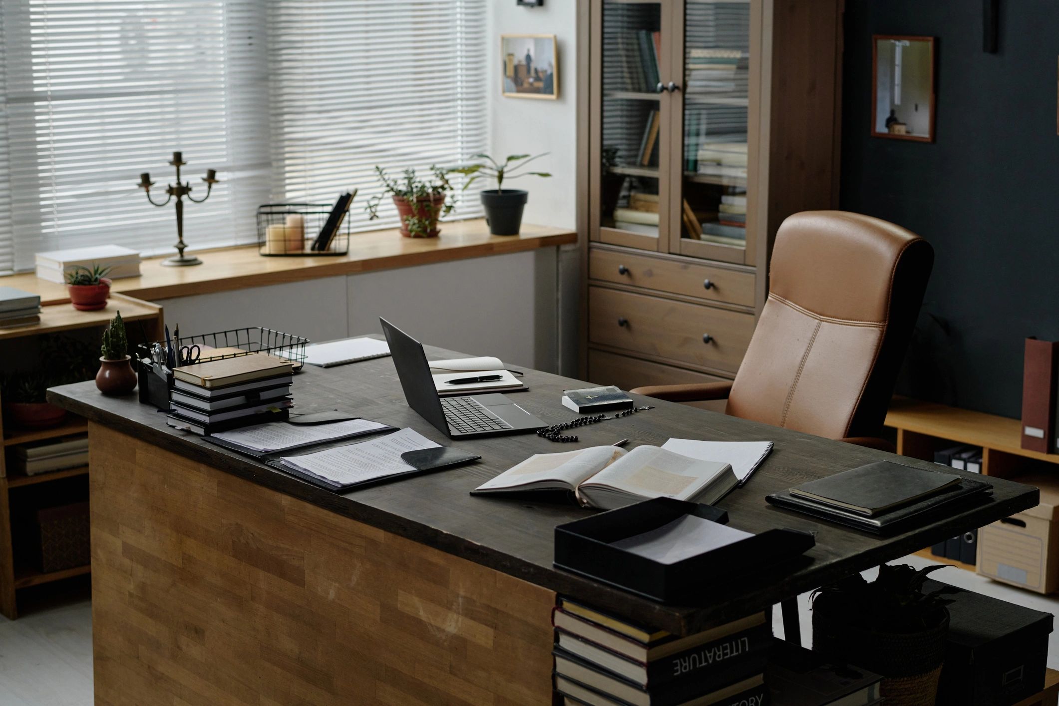 Desk workspace used for finance and asset documentation
