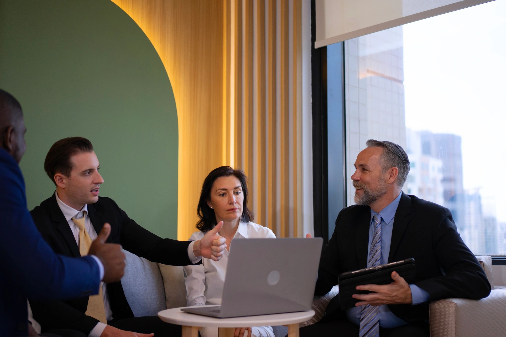 Professional advisory team meeting in office