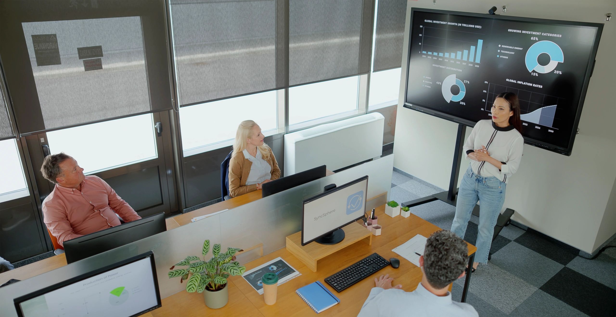 Business advisory team collaborating in a modern boardroom