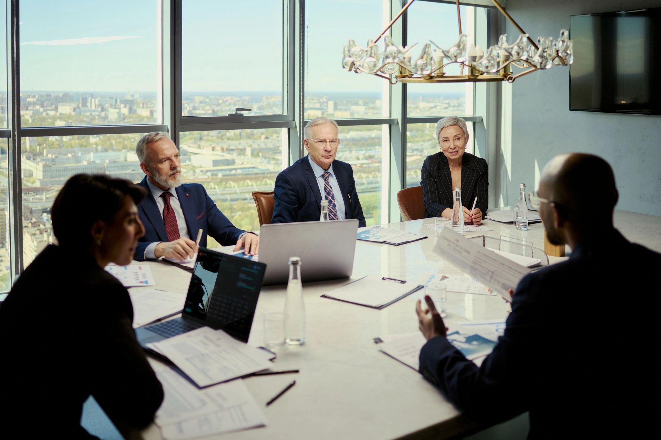 Business team discussing strategy in boardroom